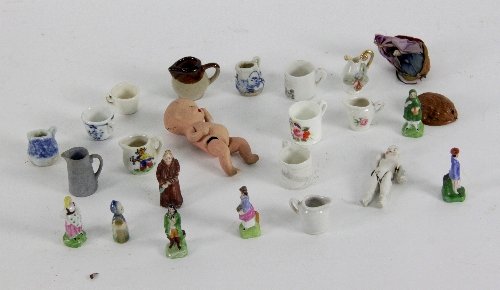Seven miniature porcelain male