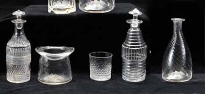 Seven mold blown uncolored glass