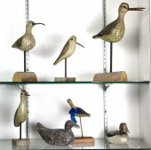 SEVEN PAINTED AND CARVED WOOD