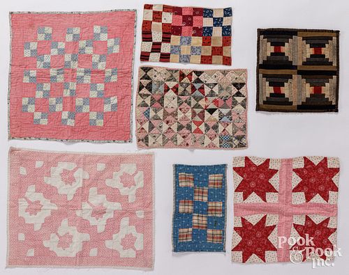 SEVEN PATCHWORK DOLL QUILTS, 20TH
