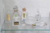 SEVEN PERFUME BOTTLES. Includi