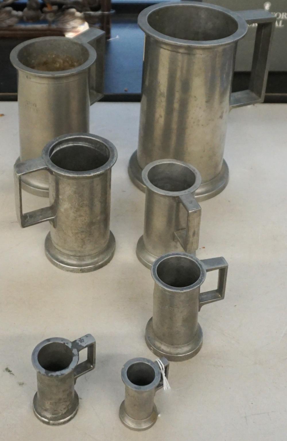 SEVEN PEWTER ENGLISH GRADUATED