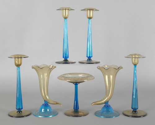 Seven pieces of blue and yellow art