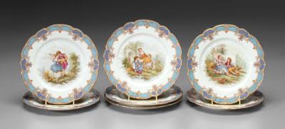 Seven porcelain plates: central