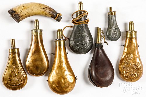 SEVEN POWDER FLASKS, 19TH AND