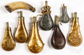 SEVEN POWDER FLASKS, 19TH AND