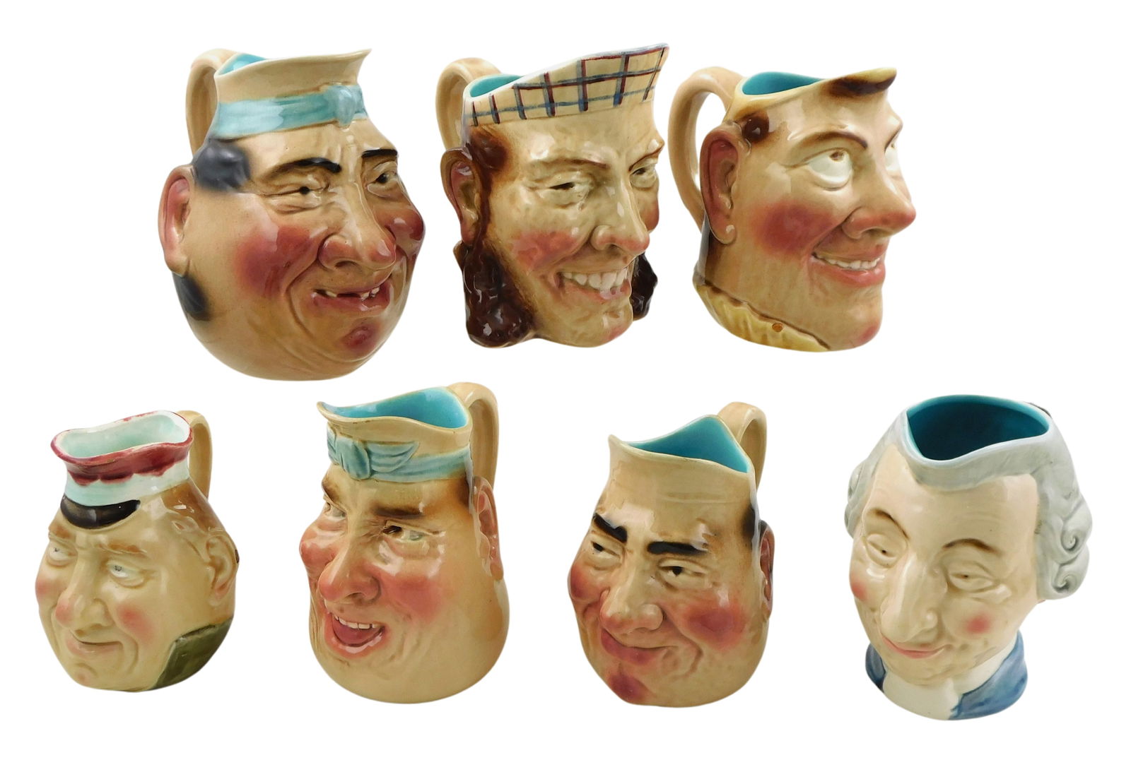 SEVEN SARREGUEMINES CHARACTER JUGS,