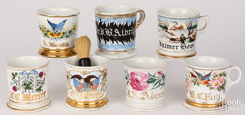 SEVEN SHAVING MUGS, CA. 1900Seven