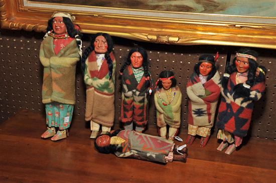 SEVEN SKOOKUM DOLLS. 9'' h. to 16''
