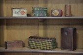 SEVEN SMALL BOXES. A walnut sl