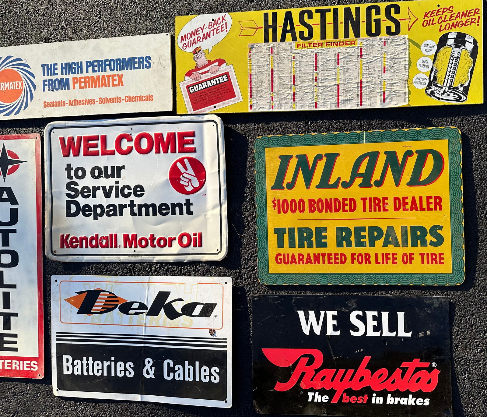 SEVEN SMALL SIGNS RANGING IN SIZE