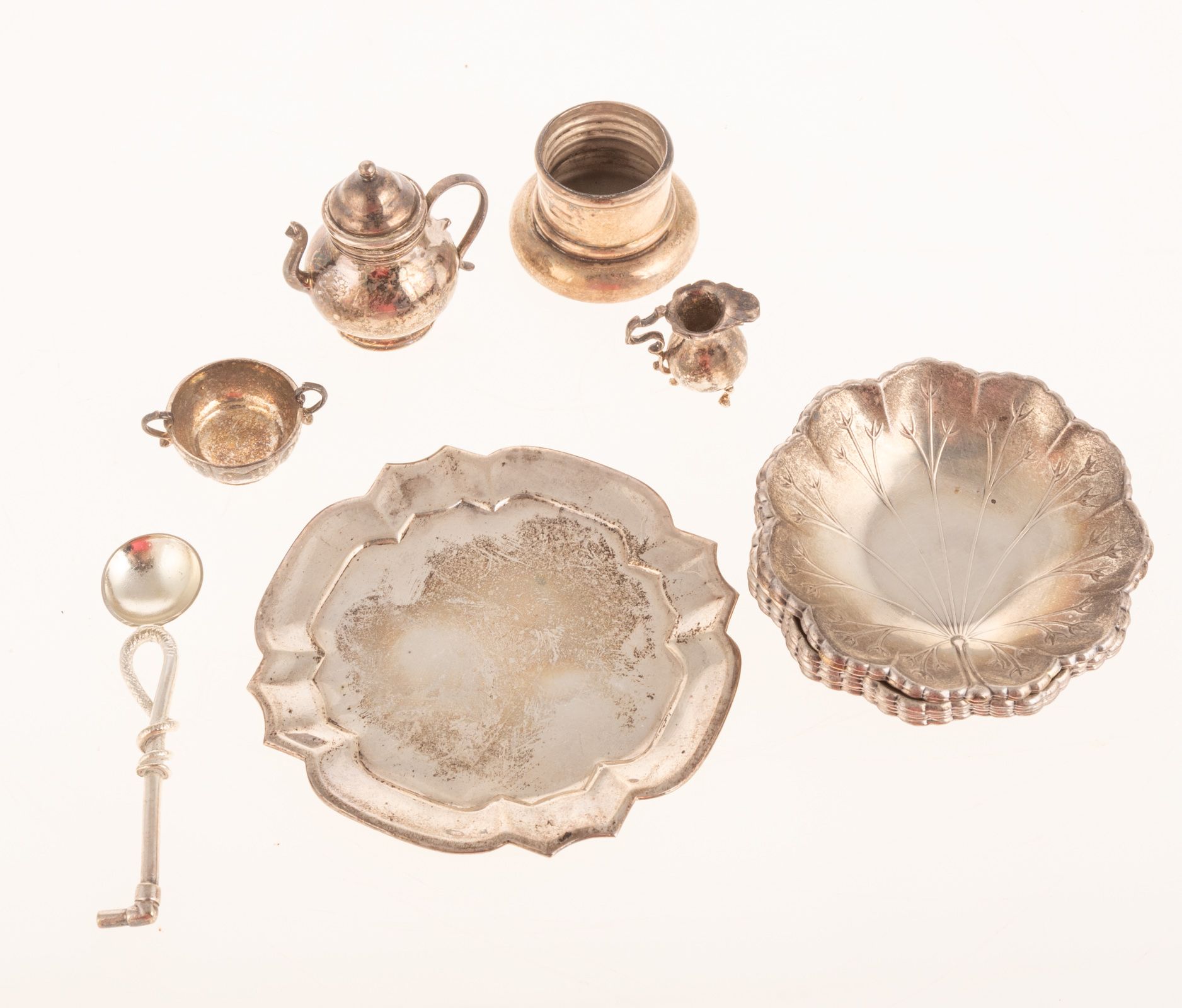SEVEN STERLING FOLIATE NUT DISHES &