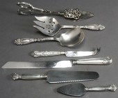 SEVEN STERLING SILVER HANDLED