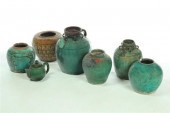 SEVEN STORAGE JARS AND TEAPOT.