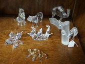 SEVEN SWAROVSKI CABINET ARTICL
