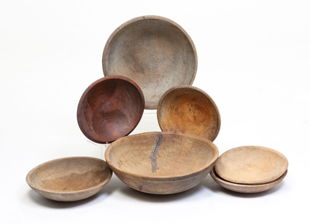 SEVEN TURNED WOOD BOWLS.