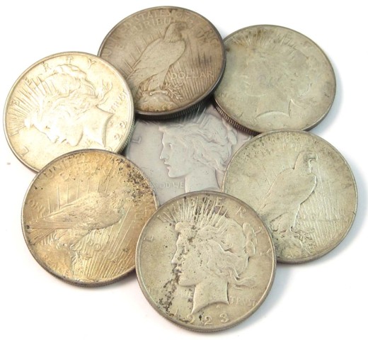 SEVEN U.S. SILVER PEACE DOLLARS