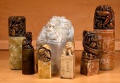 Seven vintage Asian carved sto