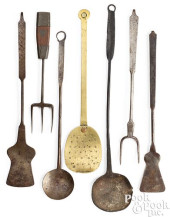 SEVEN WROUGHT IRON AND BRASS K