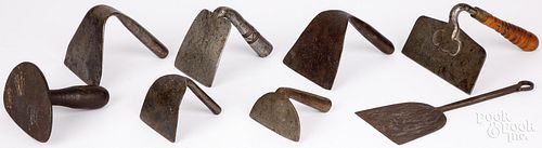 SEVEN WROUGHT IRON DOUGH