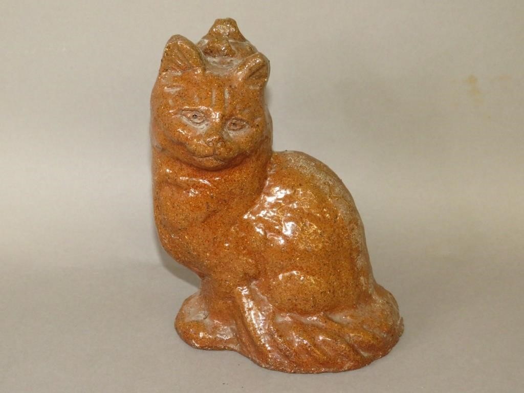 SEWER TILE FIGURINE DOORSTOPca.
