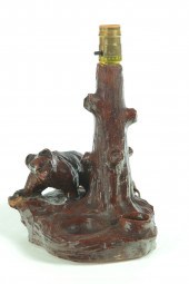 SEWERTILE FIGURAL LAMP BASE.