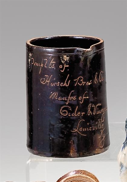 Sgraffito and manganese glazed