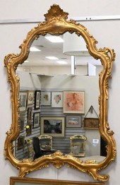 SHAPED GILT CARVED MIRROR, 49"