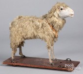 SHEEP ON PLATFORM PULL TOYShee