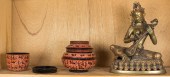SHELF OF ASIAN DECORATIONS She