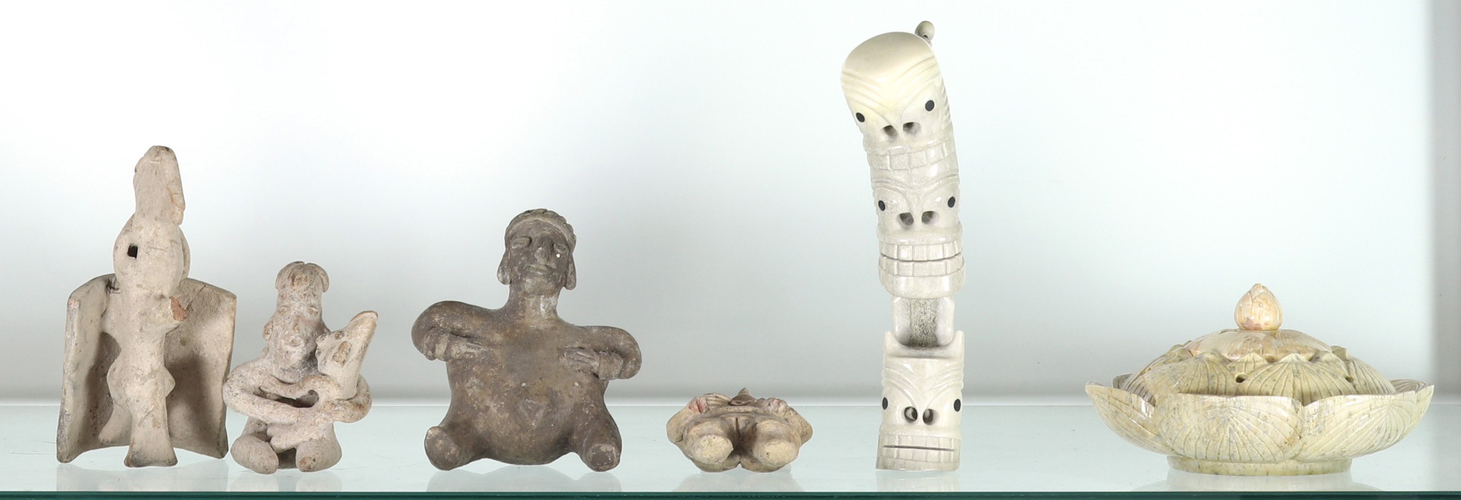 SHELF OF ETHNIC FIGURES Shelf of