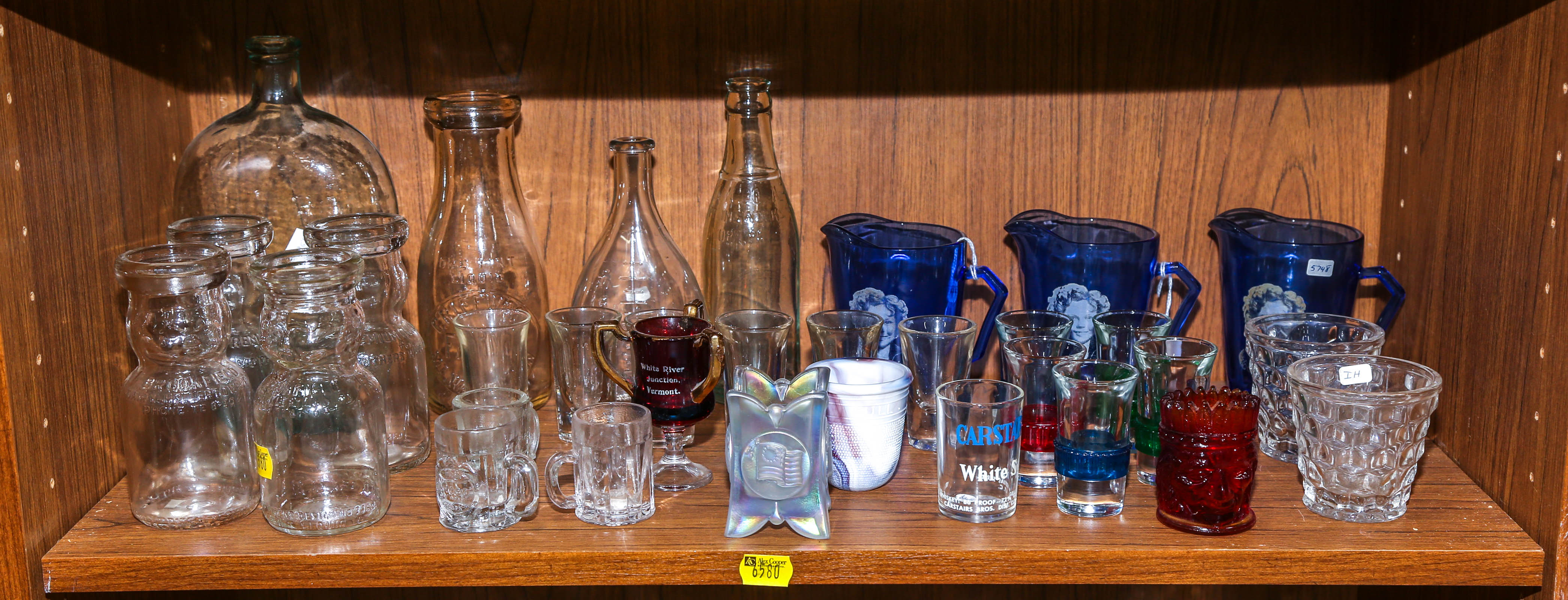 SHELF OF GLASSWARE Including a