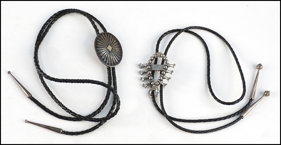 SHIELD FORM STERLING SILVER AND