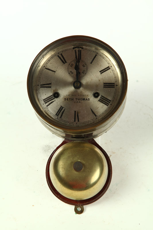 SHIP'S BELL-UNDER CLOCK.  Seth