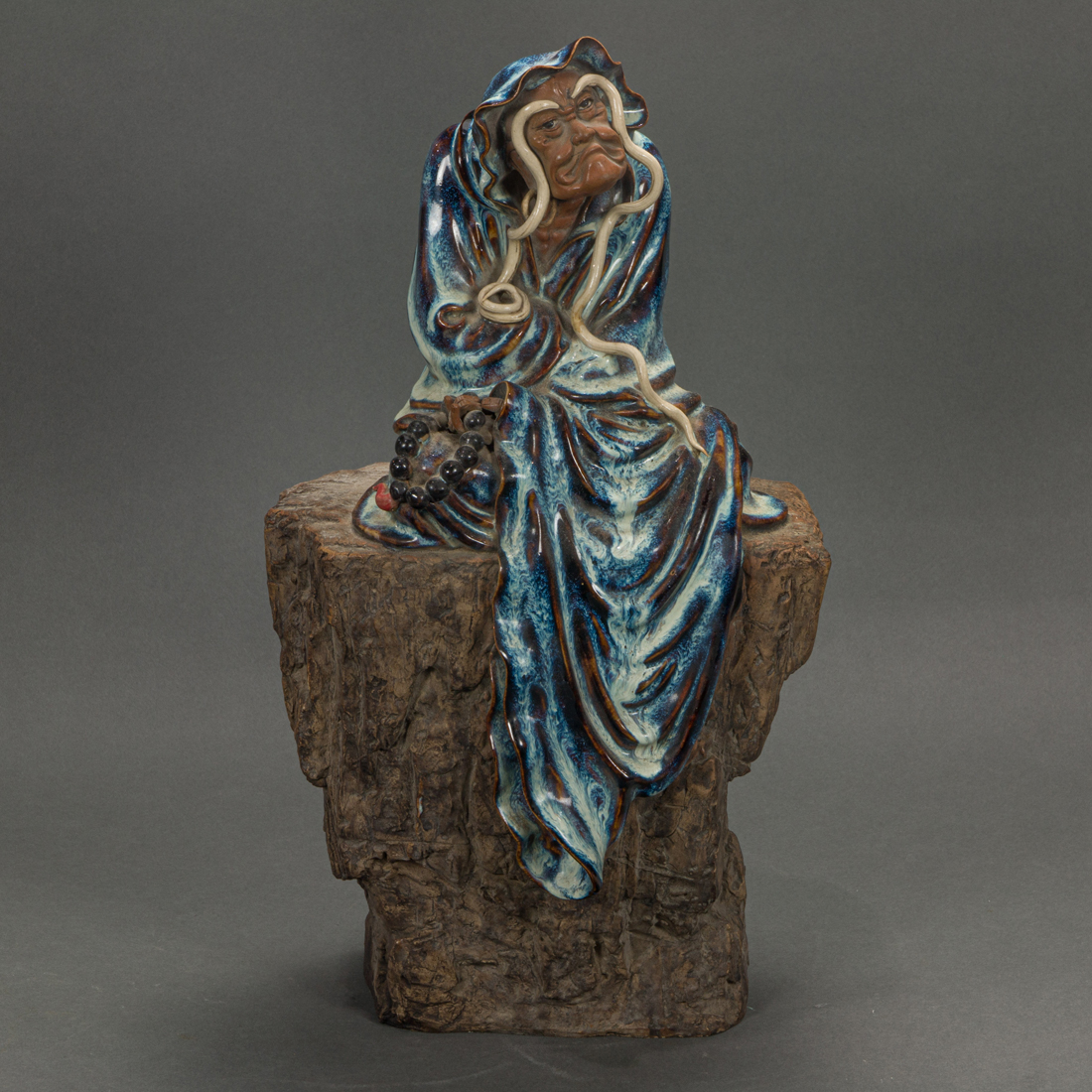 SHIWAN WARE FIGURE OF A LUOHAN