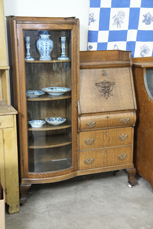 SIDE-BY-SIDE BOOKCASE. Oak having a