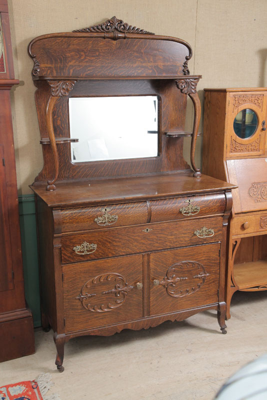 SIDEBOARD WITH MIRROR. Oak having a