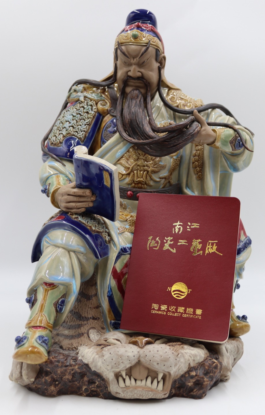 SIGNED ENAMEL DECORATED SEATED