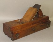 SIGNED "P. HELMAN" WOODEN PILA