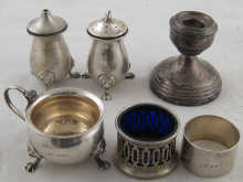 Silver. A napkin ring a three piece