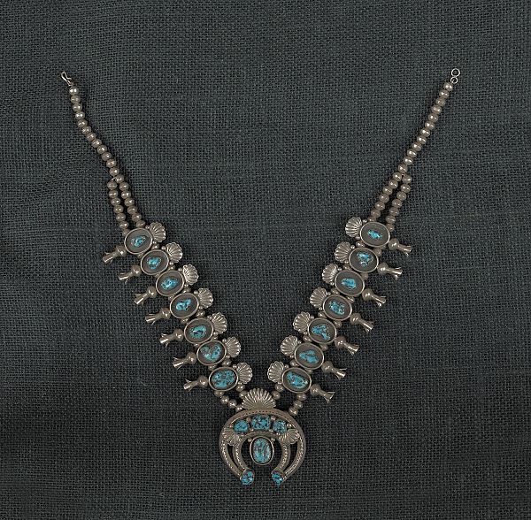 Silver and turquoise squash blossom