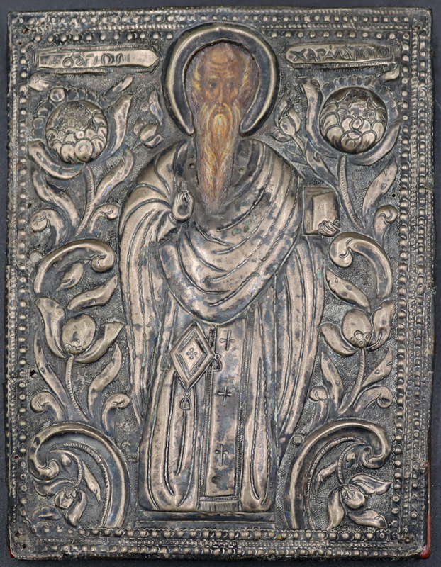 SILVER. ANTIQUE PAINTED ICON WITH
