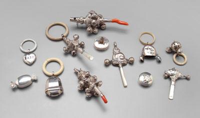 Silver baby rattles and boxes: nine