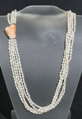 SILVER, CARVED CORAL AND FRESH