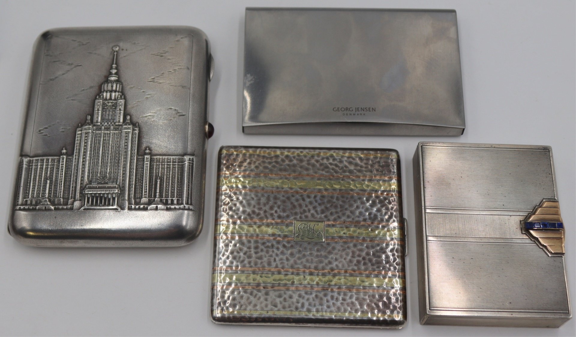 SILVER. COLLECTION OF (3) HINGED
