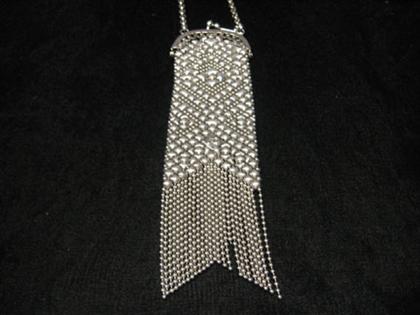 Silver colored mesh purse   