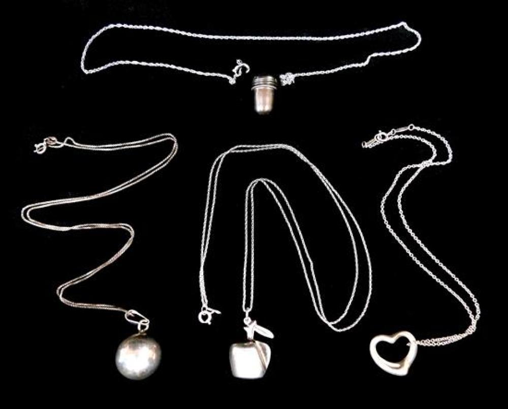 SILVER: FOUR PENDANT NECKLACES