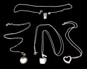 SILVER: FOUR PENDANT NECKLACES