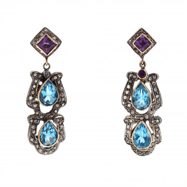 SILVER, GOLD, AND GEM-SET EAR
