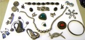 Silver jewelry including: a Me